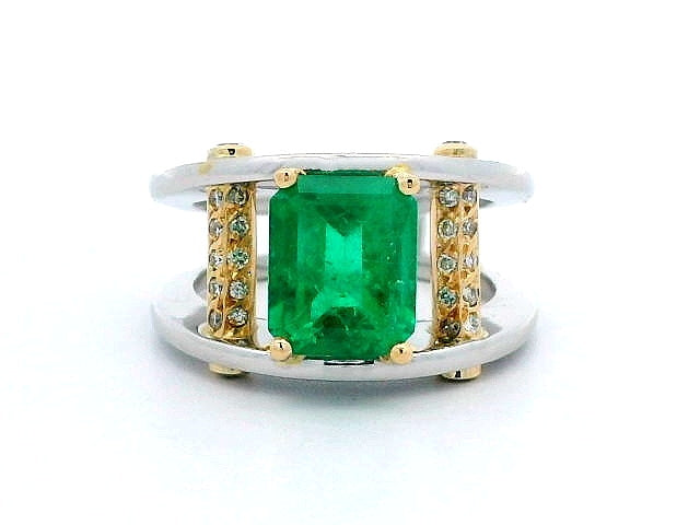 Platinum and18KT Emerald & Diamond Ring